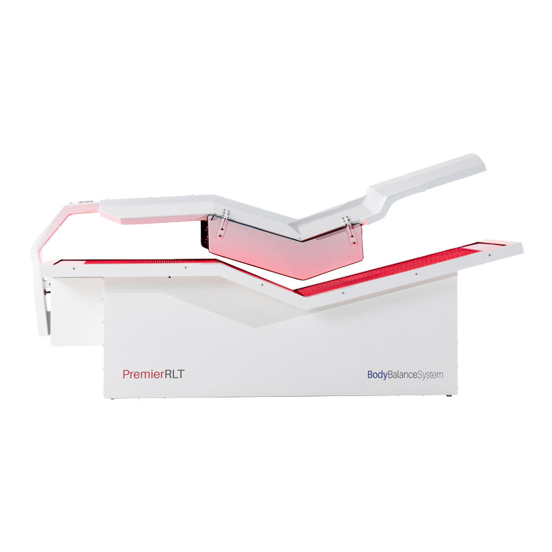 Body Balance System PremierRLT zero gravity red light therapy bed powered on side profile with canopy closed on white background