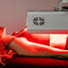 Person Receiving Targeted Treatment Body Balance System ApolloArc Red Light Therapy Device - Adjustable Arm LED Treatment for Targeted Pain Relief and Skin Rejuvenation