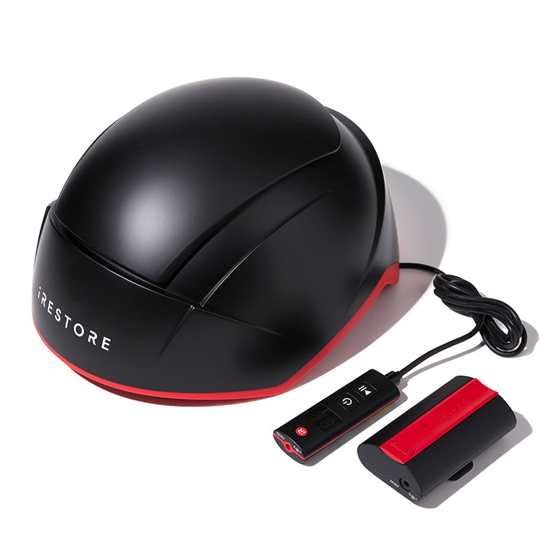iRestore Elite laser hair growth helmet with control unit and battery pack.
