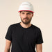male model posing with the iRestore Professional laser hair growth helmet