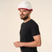 male model posting with the iRestore Professional laser hair growth helmet on his head.